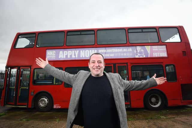 Sean Ryan from Shop It Local with the bus that Amazing Graze are going to turn into homeless accomodation