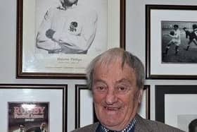 Malcolm Phillips, who won 25 England caps and is a former president of the Rugby Football Union, admires the displays in Fylde's International Room.