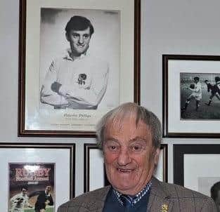 Malcolm Phillips, who won 25 England caps and is a former president of the Rugby Football Union, admires the displays in Fylde's International Room.