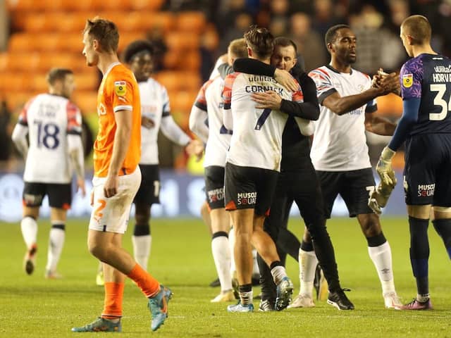 Nathan Jones celebrates with his players at the final whistle