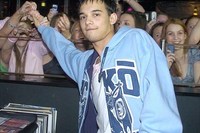 Rapper DJ Kenzie meets fans at The Syndicate in 2005