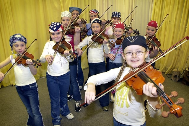 Ten violin-playing pupils from Claremont Primary School had been chosen to perform at a music festival in Liverpool. Devon Bailey (front right) lead the group in a tune with Charlotte Eyre, Chloe Brown, Stephanie Thompson, Jaime White, Natalie Wilson, Stephanie West, Samantha Moor, Terri Buchan and Stacey Gill.