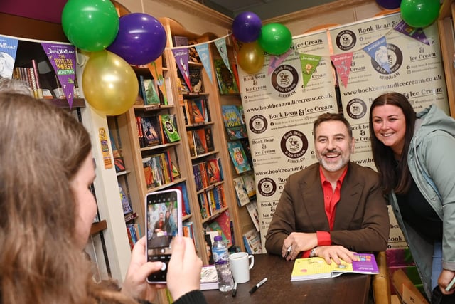 LANCASHIRE POST - BLACKPOOL - 15-07-23  Celebrity, comedian and children's author David Walliams promotes his new book, The World's Worst Monsters, at Book Bean and Ice Cream, Kirkham, where he met excited fans and their parents, signed booked and posed for photographs.