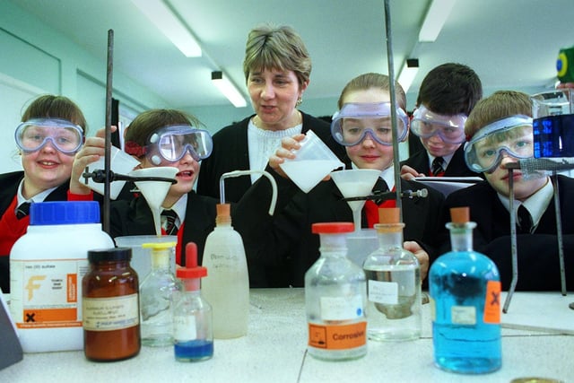 The school unveiled state-of-the-art science facilities after a two-month overhaul of the school's laboratories in 2000
Pic shows pupils busy with their experiments, watched by Head of Science Lesley McKenzie. L-R: Lauren Dickens, Terri Costigan, Laura Parker, Daniel Earnshaw and Alan Herrington