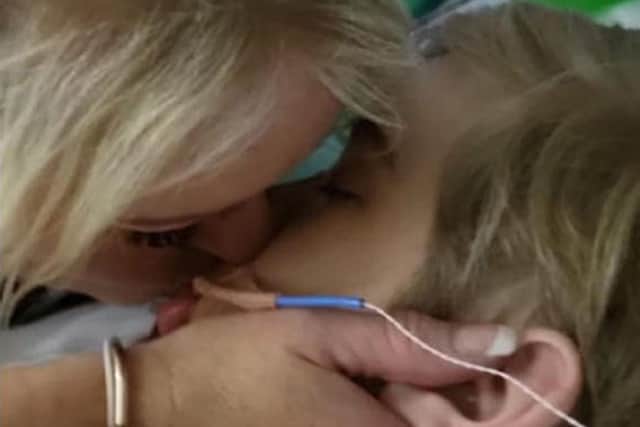 Hollie Dance with her son Archie Battersbee in hospital