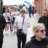 The Ed Sheeran look-alike, who was accompanied by a number of security officers, was mobbed by excited fans requesting selfies and taking videos during a day at Blackpool Pleasure Beach at the weekend. (Picture by Dan Oxtoby Photography)