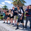 The contestants at the start of the new series of Race Across the World. From left, Andrew, Molly, Katie, Harrison, Jo, Kush, Mark, Margo, Puja and Roshni (Picture: BBC/Studio Lambert)