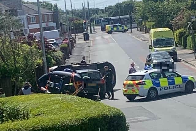 Two vehicles collided in Fleetwood, leaving one car on its side (Credit: Jolene Hart)