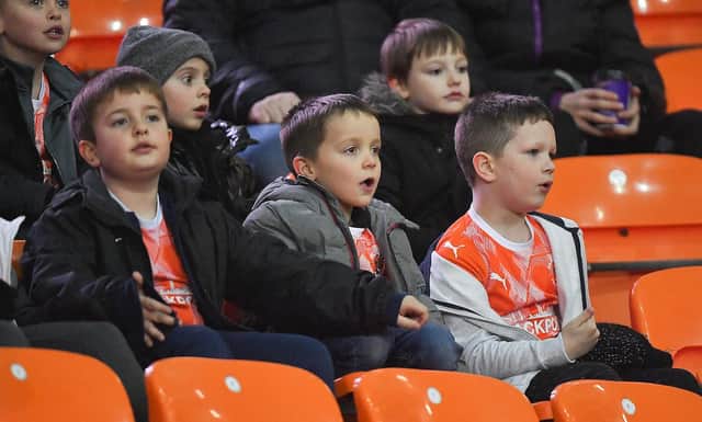 These young fans couldn't keep their eyes off the game...