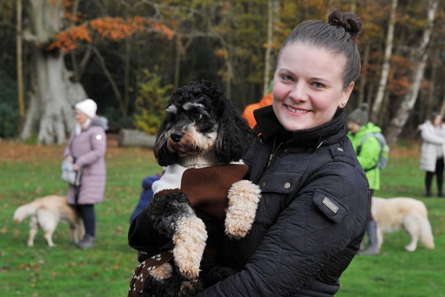 BLACKPOOL - 04-12-22 Dogs and their owners take part in Walkies for Wards, a festive dog walk raising funds for Blue Skies Hospital Funds, a charity for Blackpool Teaching Hospitals, held in the grounds of Lytham Hall, Lytham. Claire Burrows with her dog Archie.