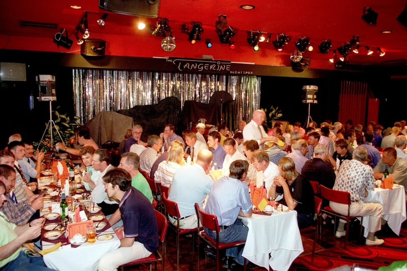 A packed Tangerine Night Spot entertains guests before a match in 1997