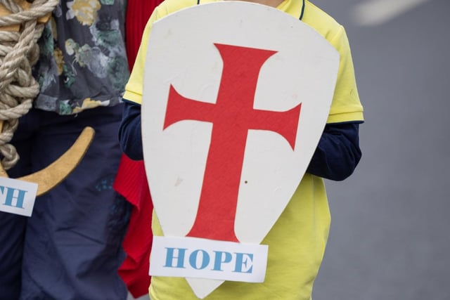 This youngster carried an important message as he took part in the Kirkham and Wesham Club Day procession