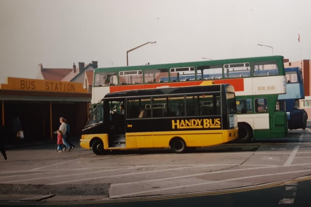 These yellow and black Handy Buses were such a familiar sight - they were the ones which nipped down the narrower streets and into far reaching parts of the community. This is a typical 1990s scene of Cleveleys Bus Station