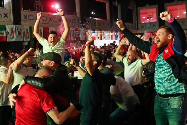Fans enjoy the atmosphere as England cruise past Senegal into the quarter finals of the World Cup in Qatar.