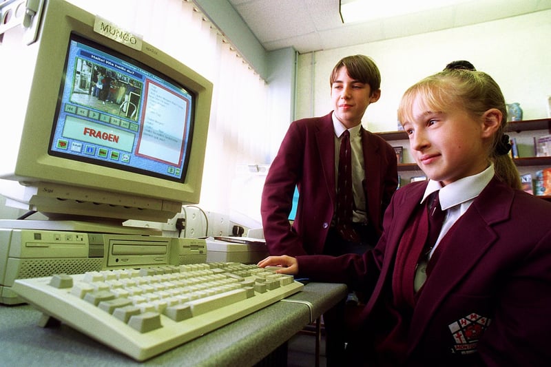 The school put in a bid to create a language school. Pic shows Tamara Carney and Graham Kennaugh using an interactive CD-Rom language programme