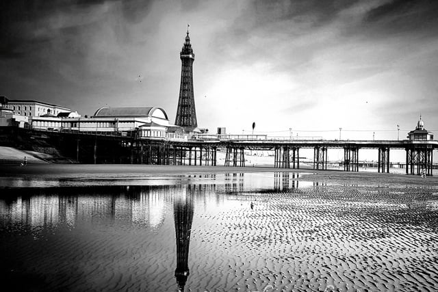 A black and white picture of the pier