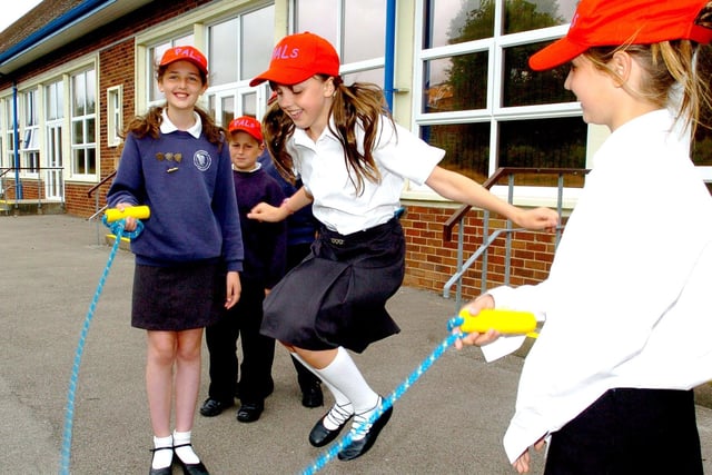 Children at Stanley Junior School in Blackpool are taking part in traditional games. Pictured from left to right are Tessa Jones, 11, Sam Guttridge, 11, Saffy Meredith, 11, and Kirsten Jones, 11