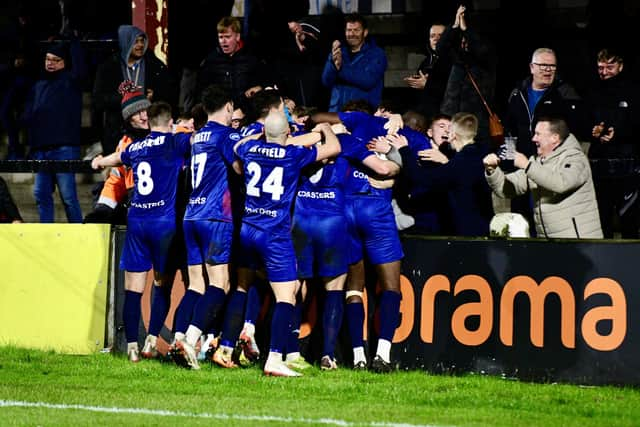 AFC Fylde celebrate Alex Whitemore's last-gasp winner at Chorley Picture: STEVE MCLELLAN