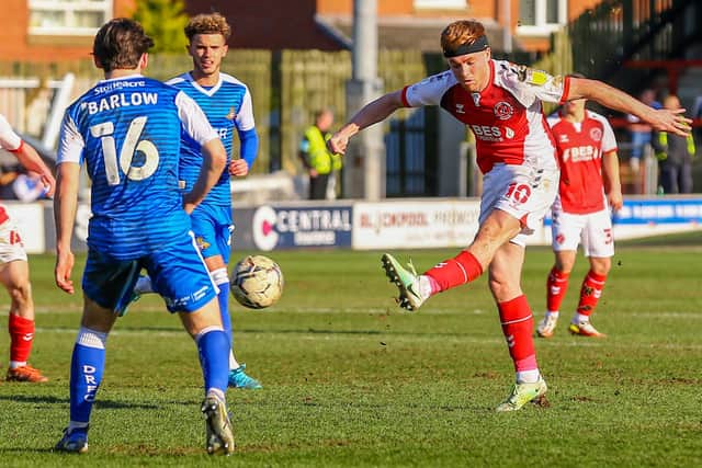 Fleetwood Town midfielder Callum Camps sends an effort at goal Picture: Sam Fielding/Prime Media Images