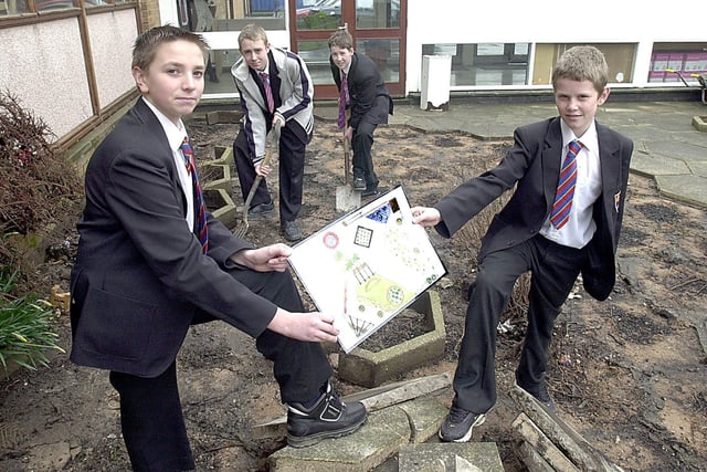 Fleetwood Cardinal Allen School students James Cummings, Matthew Sumner, Thomas Hawkins and Jake Brown with one of the memorial gardens they are helping to build at the school