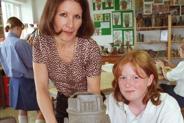 Teacher Kate Miller with pupil Emma Dugdale in her GCSE ceramics class