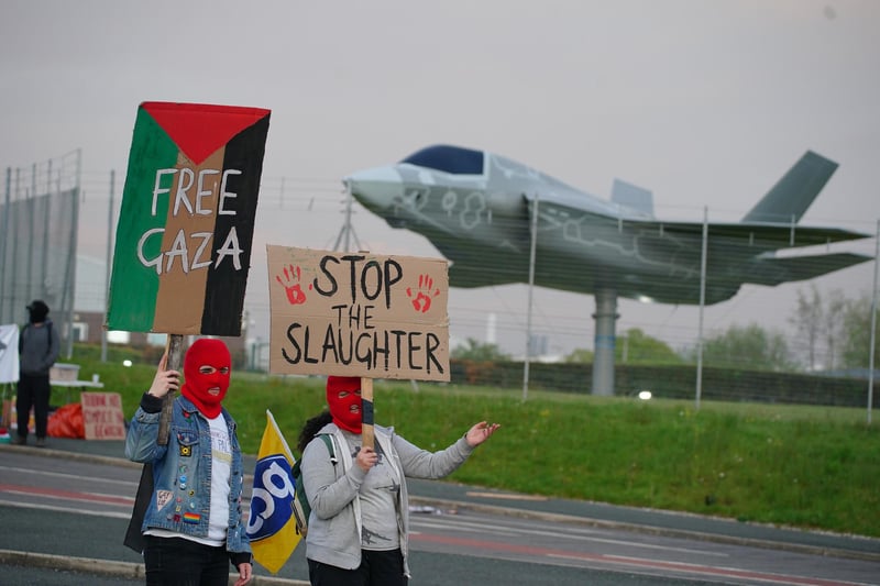 Protesters form a blockade outside weapons manufacturer BAE Systems in Samlesbury, Lancashire, in protest over the Israel-Gaza conflict and calling for an immediate ceasefire to halt the killing of civilians in Palestine.
