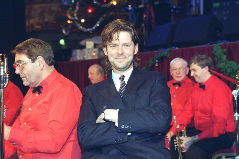 Christmas Tree Ball organiser Christopher Radcliffe Dearden, pictured with "16 Swinging Men" in 1996