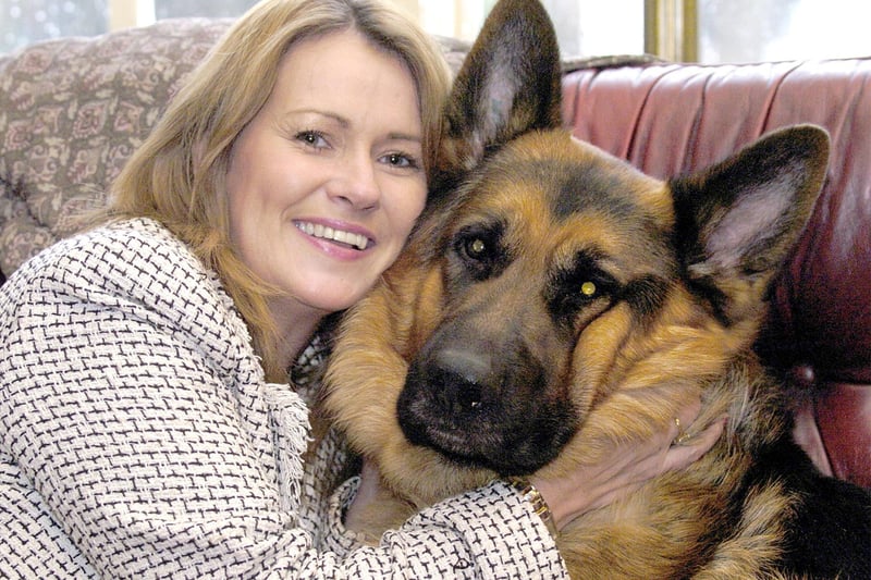 Landlady of the Eagle and Child, Weeton, Francine Wilson with dog Hammer, 2005