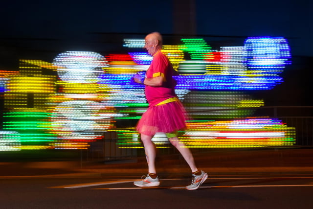 The runners enjoyed a colourful evening in the Blackpool Night Run for Brian House.