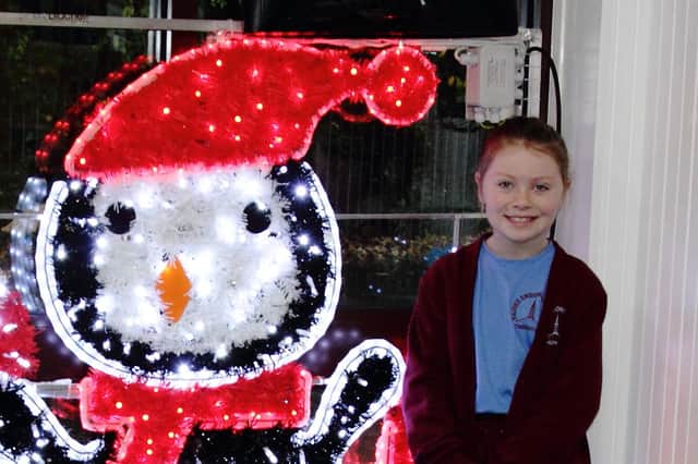 Baines Endowed pupil Amelia Booth with the tableau created from her original school artwork.