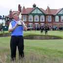 South Africa's Ernie Els lifts the Claret Jug and celebrates winning the 2012 Open Championship at Royal Lytham and St. Annes Golf Club.