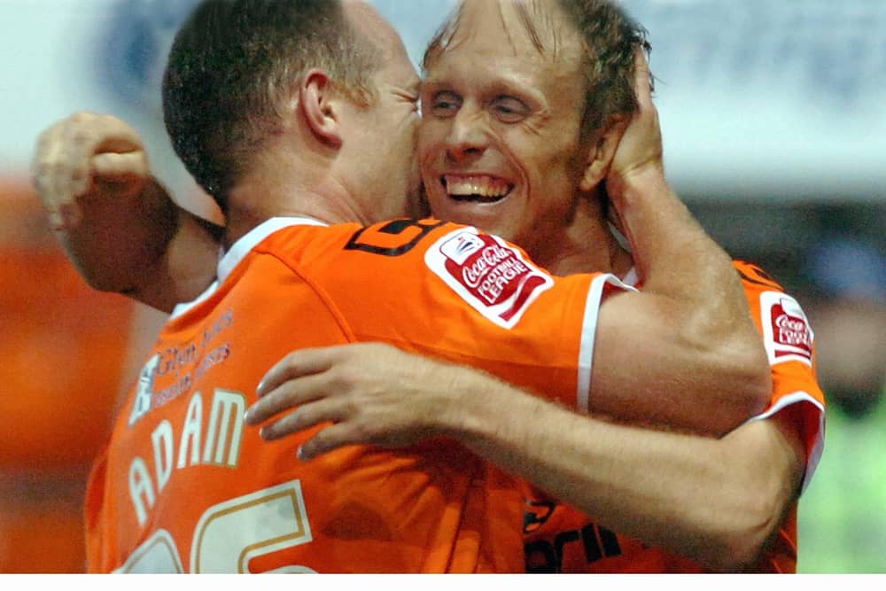 Brett Ormerod celebrates with Charlie Adam after scoring in a game against Newcastle