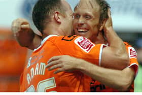Brett Ormerod celebrates with Charlie Adam after scoring in a game against Newcastle
