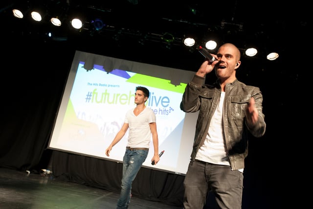 Tom (left) with bandmate Max on stage at The Hits Radio Future Hits Live event