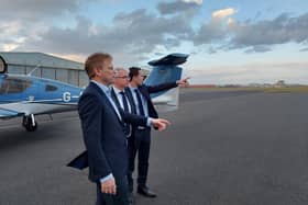 Blackpool South MP Scott Benton and Fylde MP Mark Menzies with Secretary of State for Transport Grant Shapps at Blackpool Airport