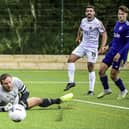 AFC Fylde's Jon Ustabasi drills a shot wide of the FC Halifax Town goal Picture: Steve McLellan