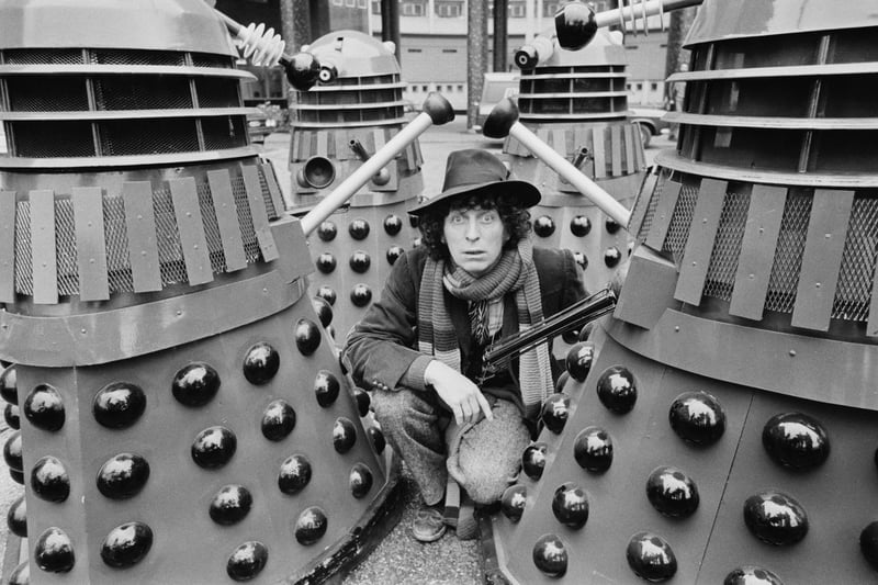 Tom Baker as the 'Doctor' with Daleks on the set of the TV series. This one had kids diving behind the couch