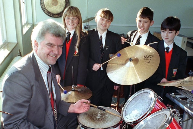 Blackpool's Director of Education Dr David Sanders tries out a drum kit in the new music room, which was part of the SMART Centre he officially opened in 1998. With him, from left, are Kirsty McKenzie, Laura Deagan, Jamie Jepson and Robert Lee.