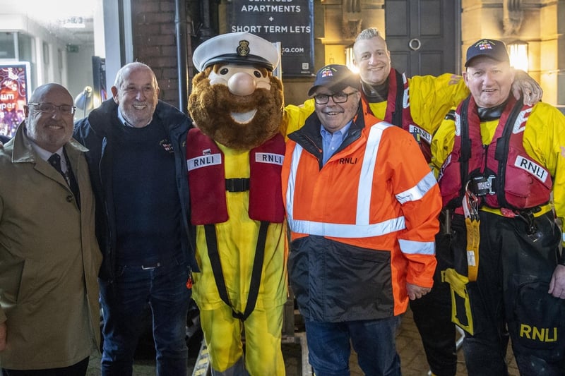 Representatives of Lytham St Annes RNLI with mascot Stormy Stan and mayor's consort Paul Little (far left) enjoying the parade. Picture: Roger Moore Photography.