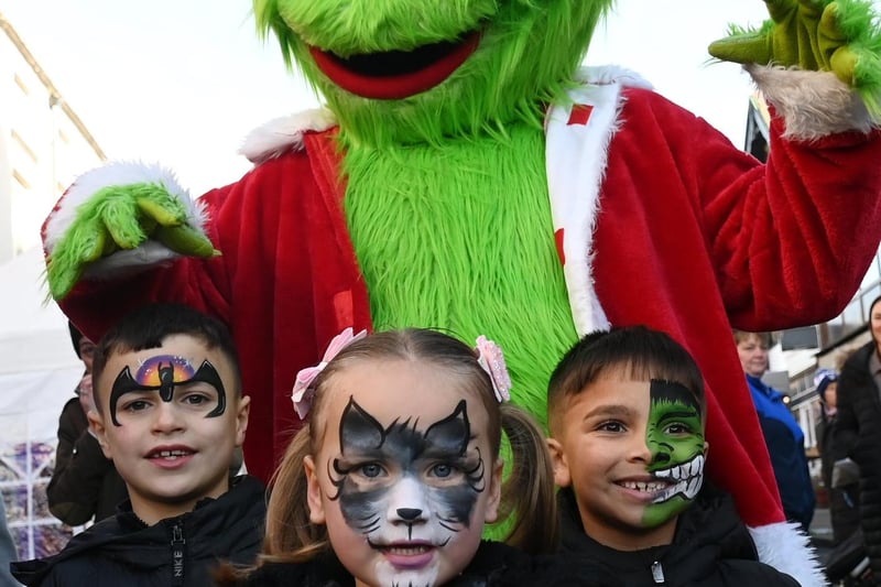 The Grinch joins in the festive parade at Kirkham.