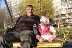 Marek Polkowski' with one of his daughters when he lived in Ukraine.