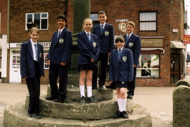 Hodgson High pupils standing at the Market Cross in Poulton after the school earned a Charter Mark, 2002