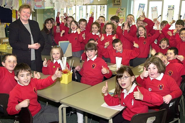 Pupils and headteacher Eileen Brierley at Our Lady of the Assumption Catholic Primary School, Marton, Blackpool, celebrate their new inspection report in 2002