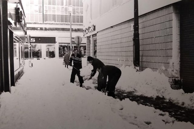 Shovelling snow outside the Evening Gazette offices in Blackpool town centre
