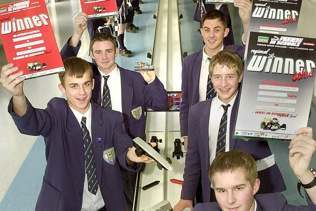 Hodgson High School pupils with their racing cars and track having won the north west round of a competition. Clockwise from left, Danny Bowden, Stephen Ladley, Iain Thorley, Steven Toole and Tom Bamber