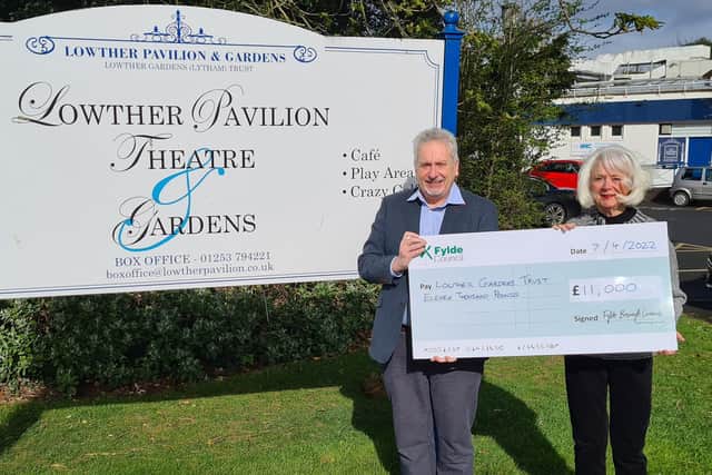 Coun Sue Fazackerley presents a cheque for £11,000 to Lowther Gardens Trust trustee David Roe.