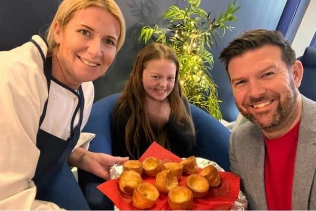 Head Dave McPartlin with Skye and a member of the school's catering team (Image: Dave McPartlin).