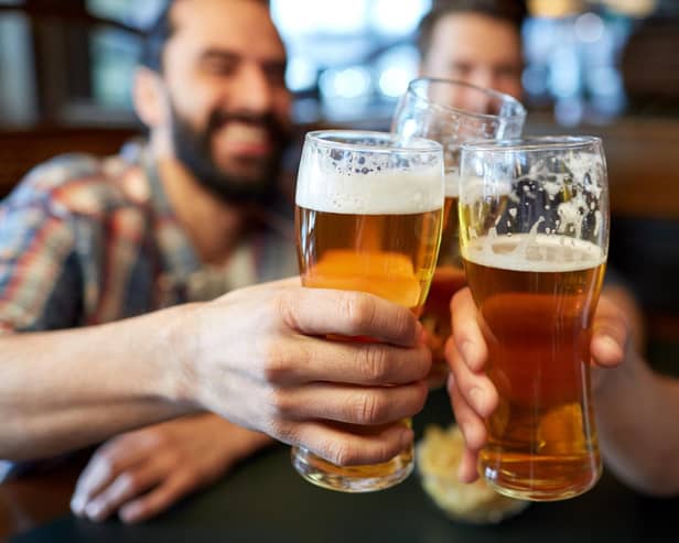 Drinking beer in a pub. Picture: Adobe Stock