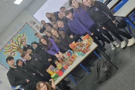 Year 8 students at Aspire support the town.