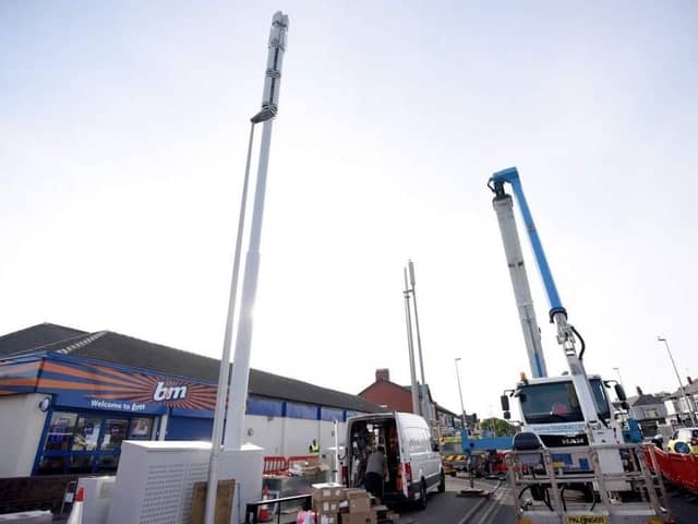 A mobile phone mast being installed on Whitegate Drive